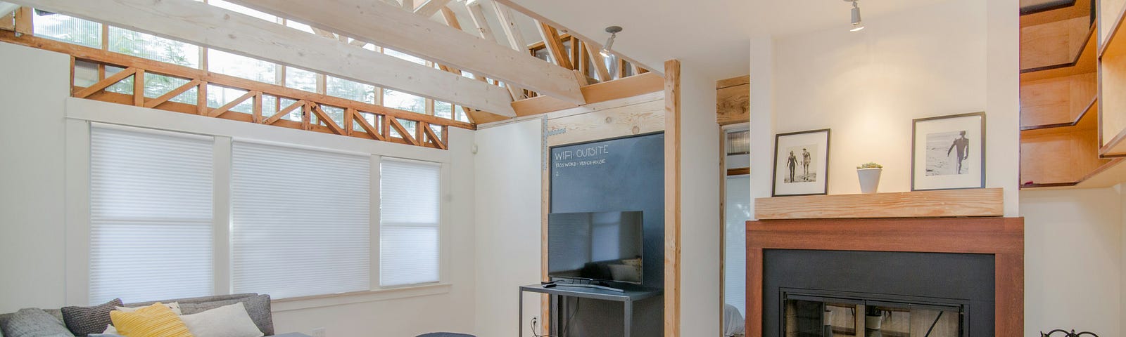 View of a home with a fireplace.