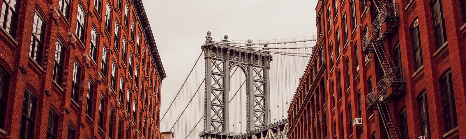 The Manhattan Bridge, as seen from the streets of Brooklyn.