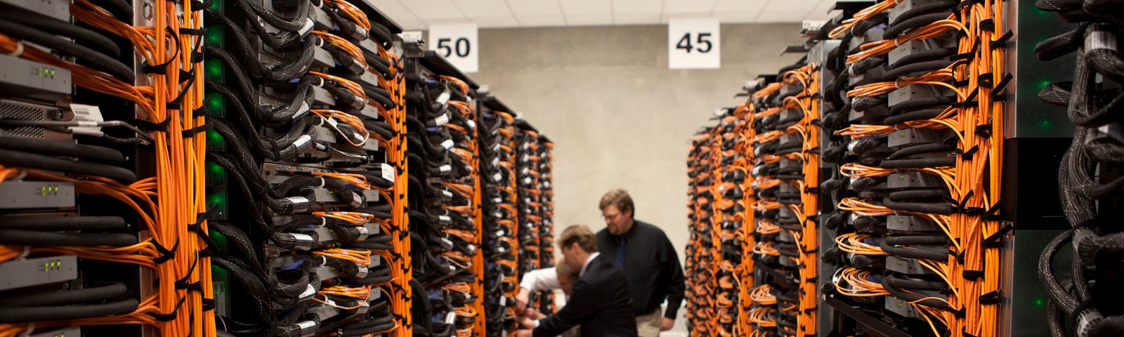 An image of a bunch of servers in a data center.