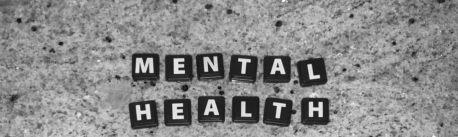 Mental health matters is spelled out in Scrabble letters.