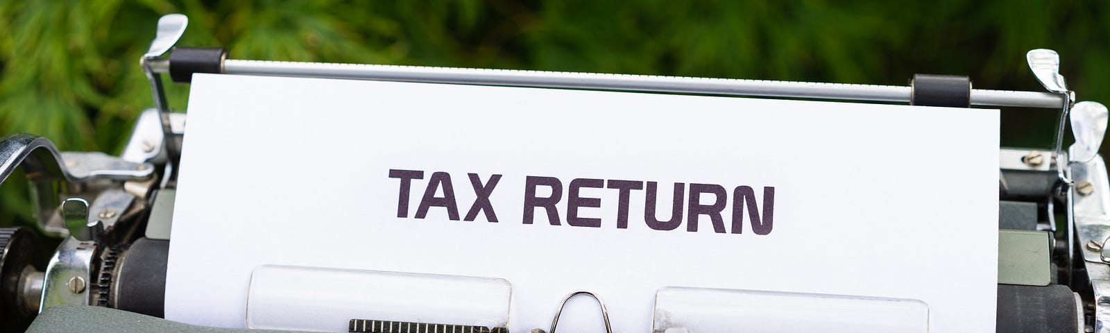 Typewriter showing tax return