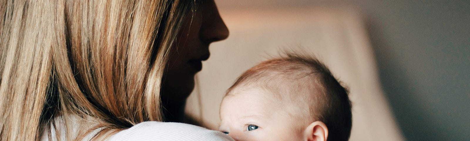 Mom holding her tiny baby