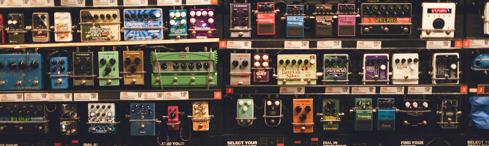 wall of guitar effects pedals