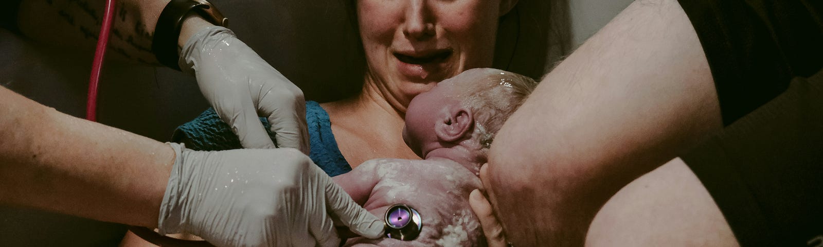 mom with baby on chest post delivery