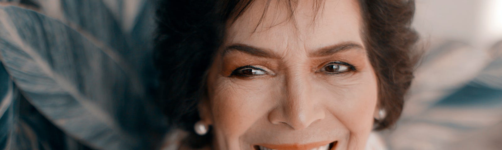 Woman smiling.