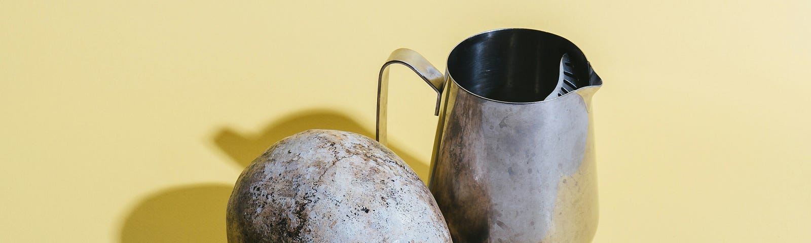 Two lemons with a skull and a steel jug