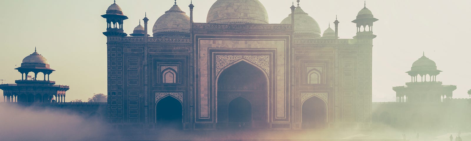 Taj Mahal in morning light and mist.