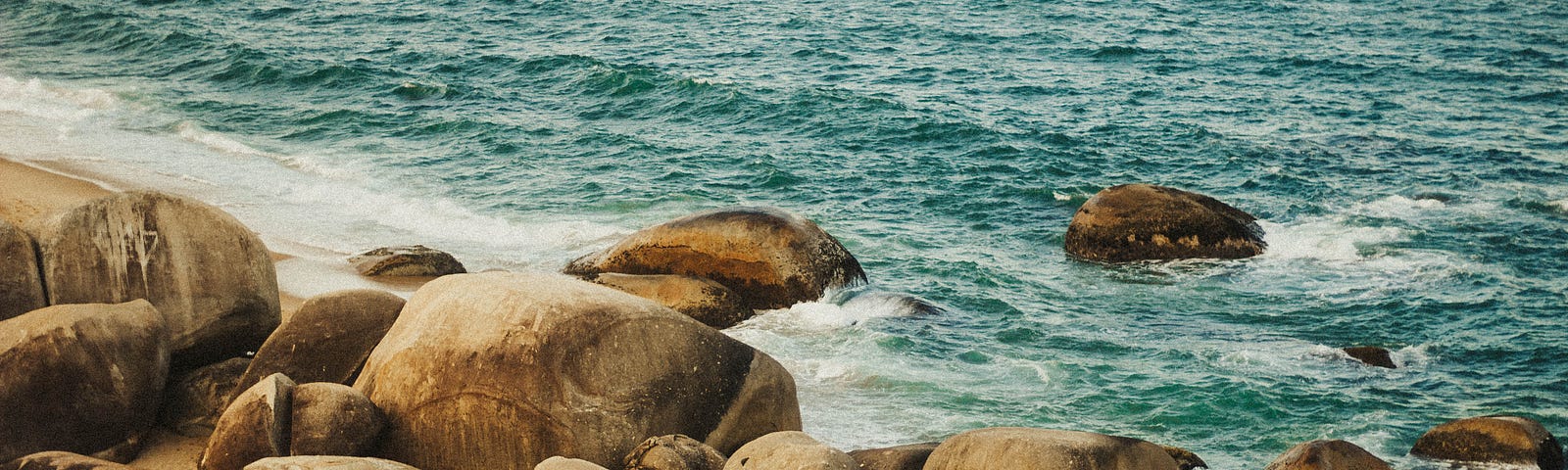 Large rocks at the edge of the sea