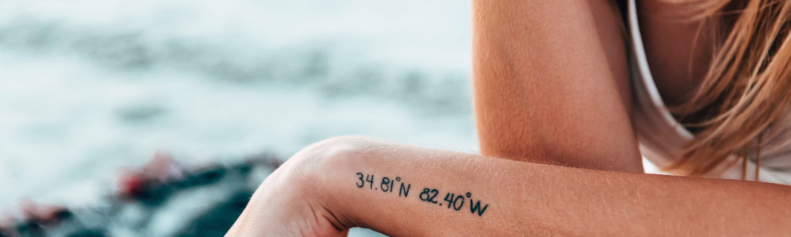 Coordinates written on a girl’s arm