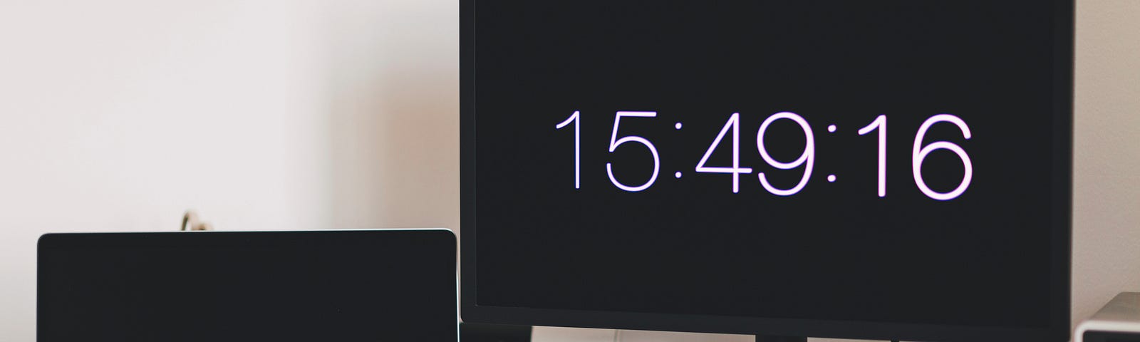Two screens with time displayed