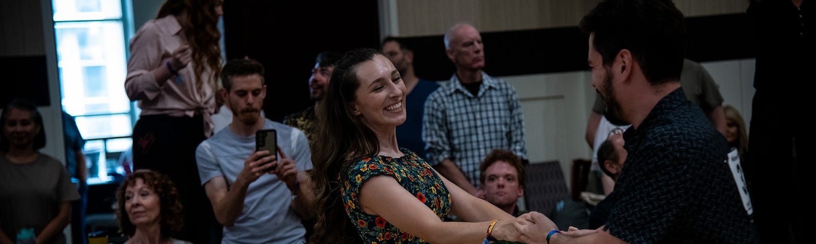 A photo of the author dancing in a West Coast Swing Dance competition in Kansas City, Missouri.