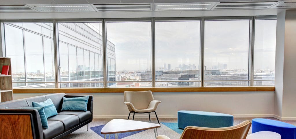 A picture of a social group meeting office room