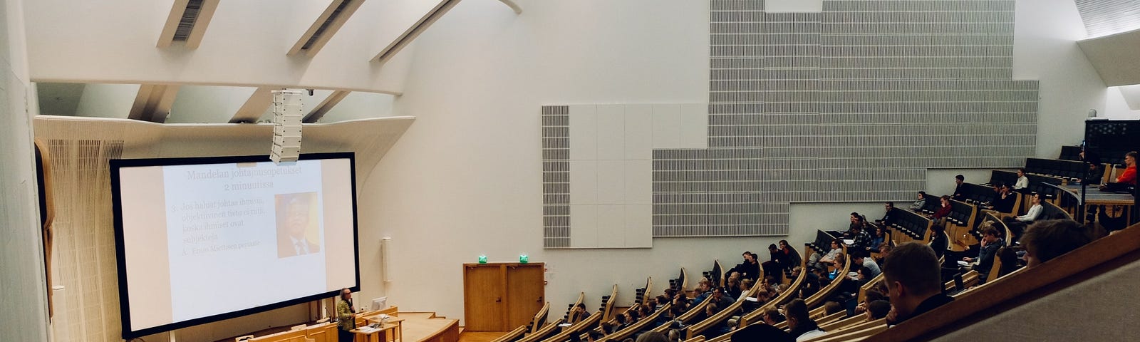 Lecture hall full of students.