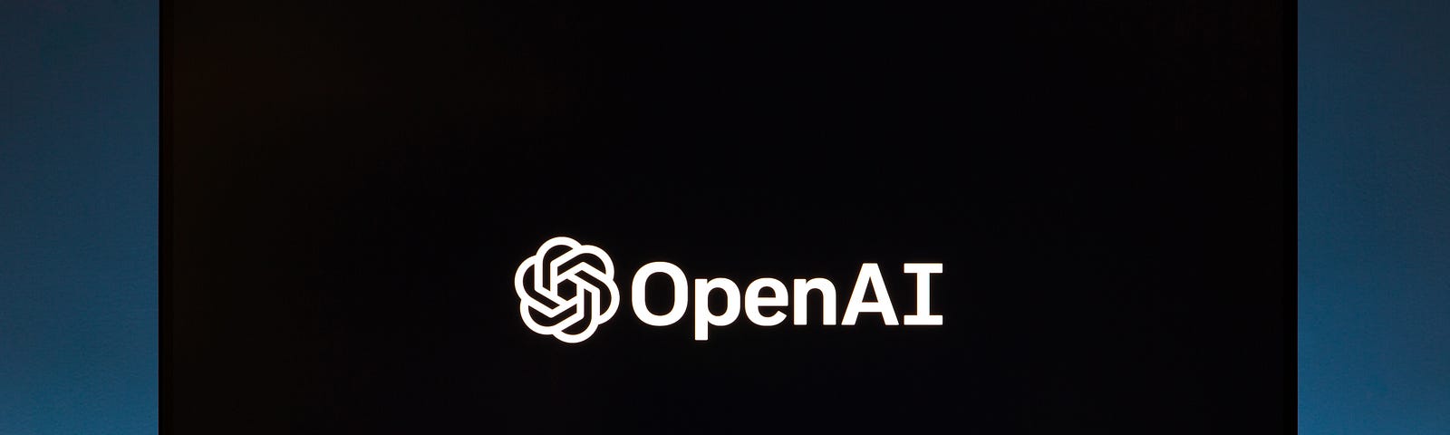 pic shows ‘OpenAI” icon on a monitor