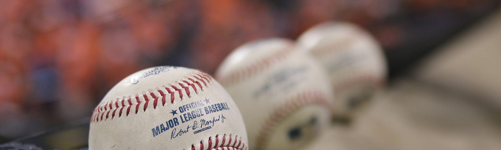 Baseballs on a wall.