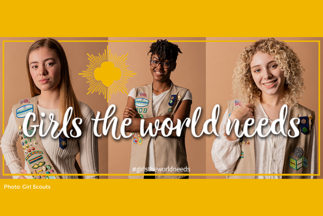 Three Girl Scouts posing in photo.