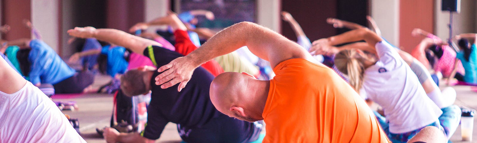 A group of people doing Yoga