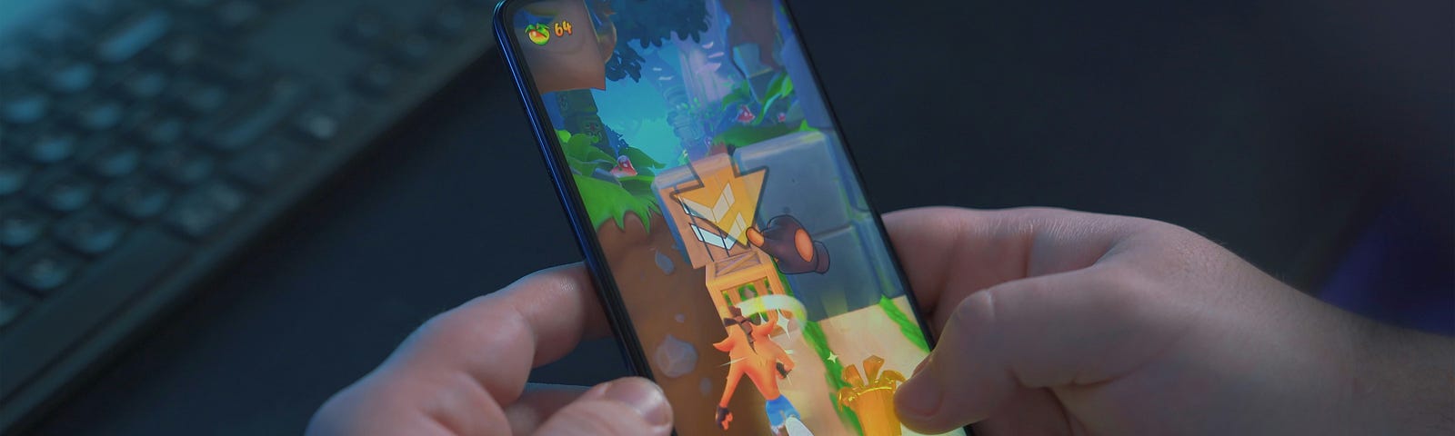 Hands hold a cell phone playing an endless runner style game.