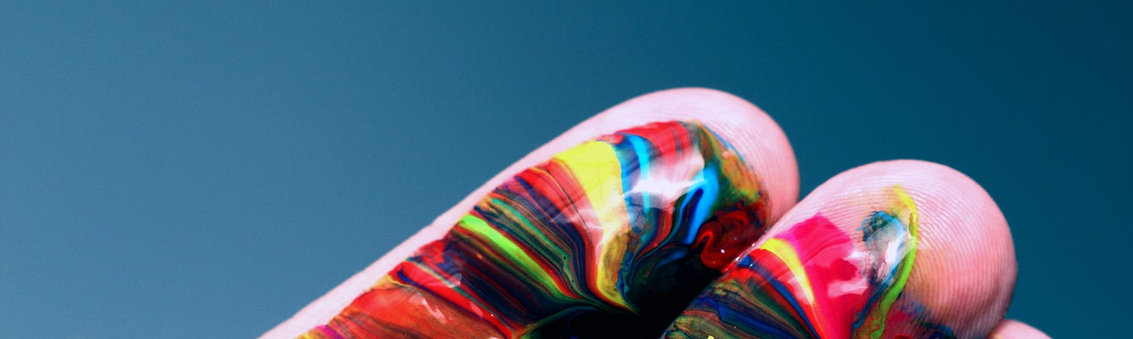 A colourful painted hand.