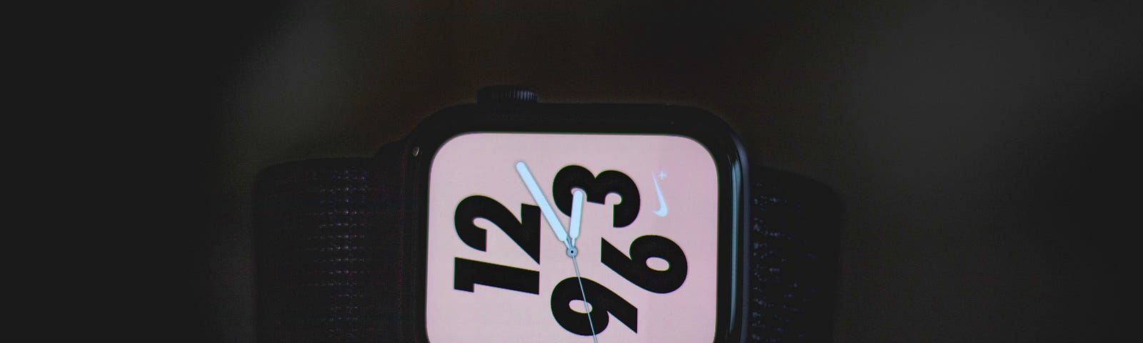 square black Nike analog watch at 3:10