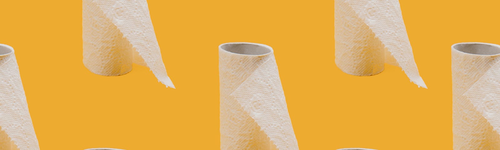 A marigold yellow background with repeated images of toilet paper rolls that are on its last legs