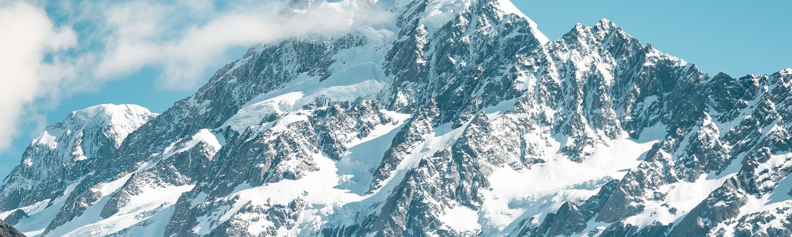 A mountain dominating the landscape of a valley