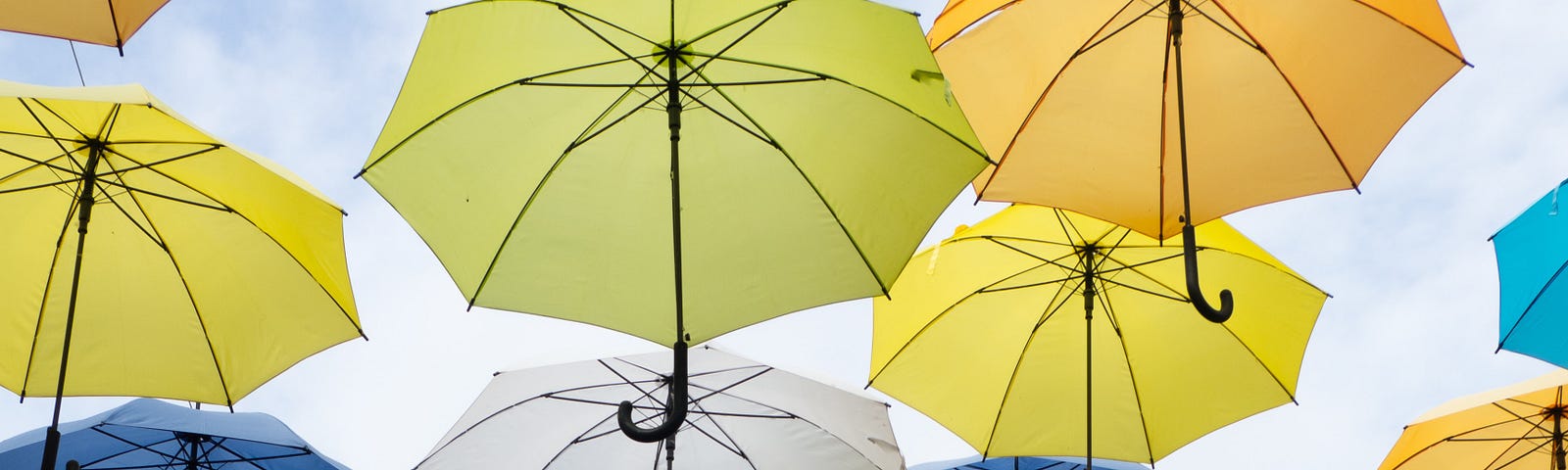 umbrellas against a sky