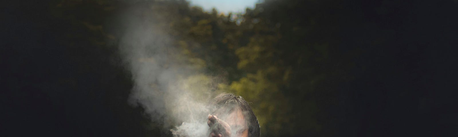 Person partially obscured by a dust cloud.