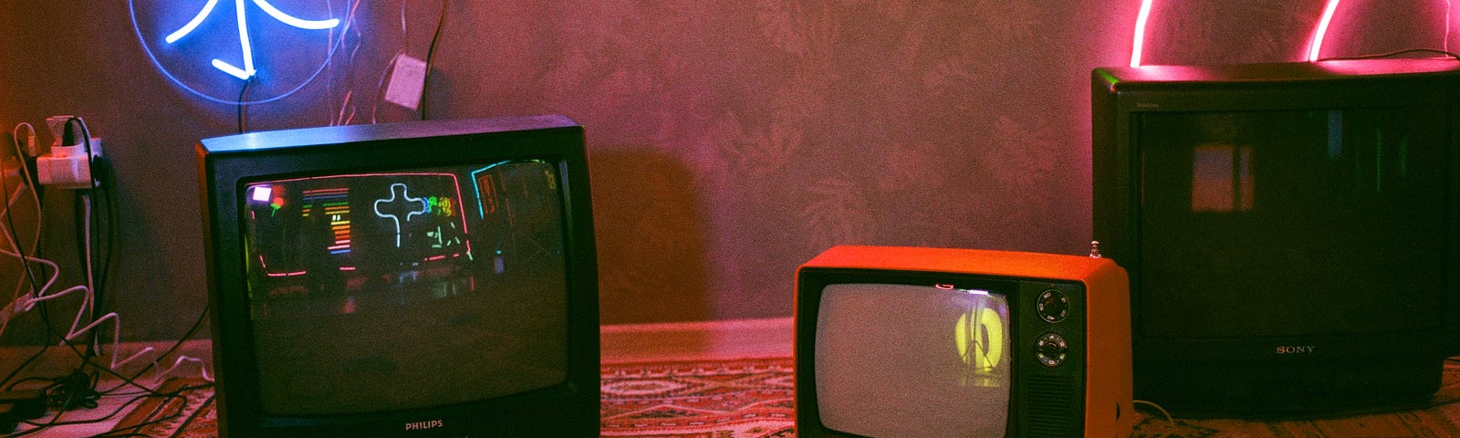 A pair of old tube televisions