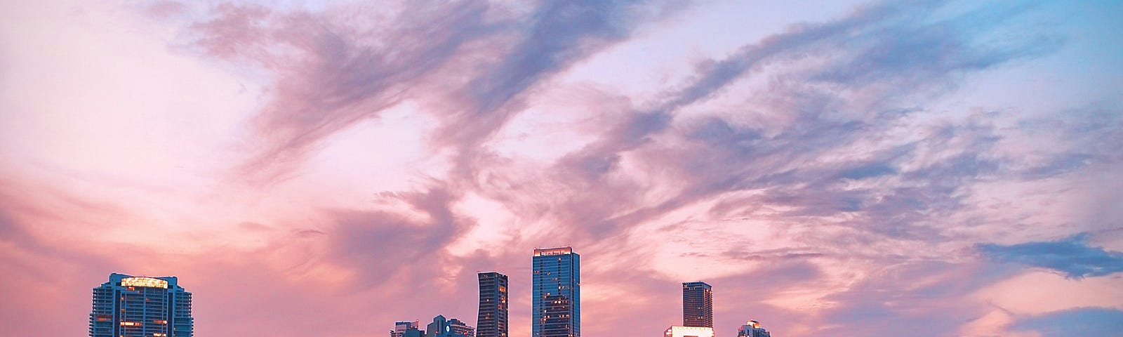 The waterfront skyline of Miami as the sunlight  fades away.