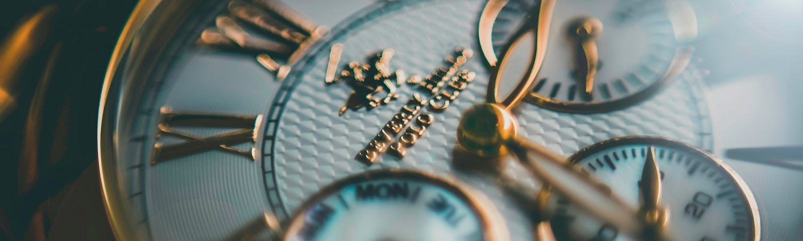 Close-up of a pocket chronograph watch with three sub-dials.