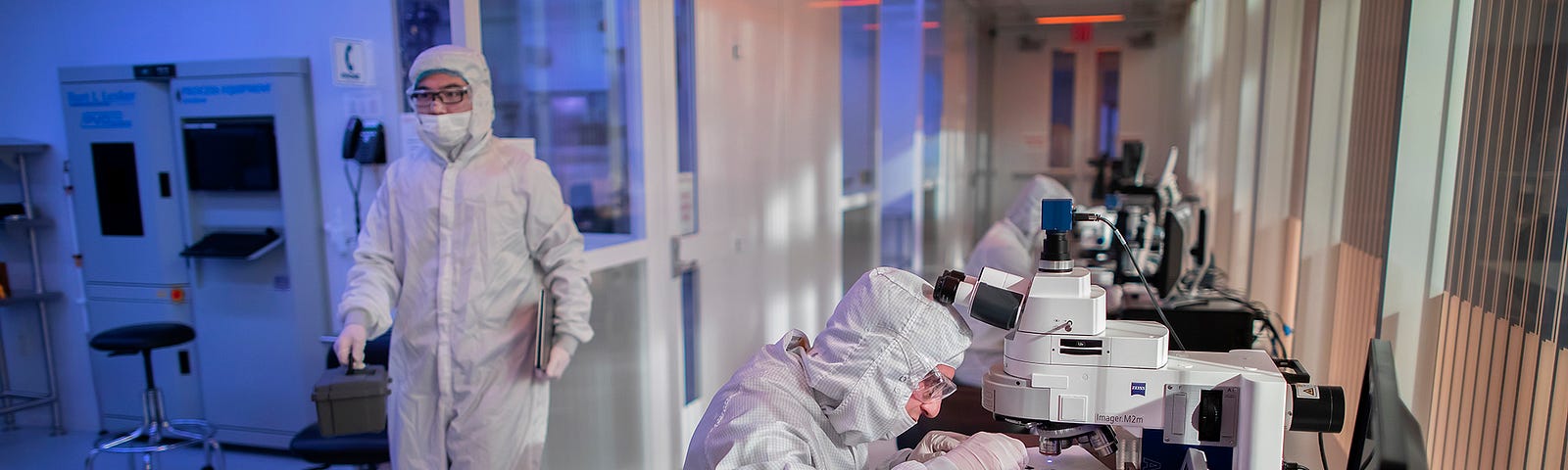 Singh Center researchers work in head-to-toe cleanroom suits.