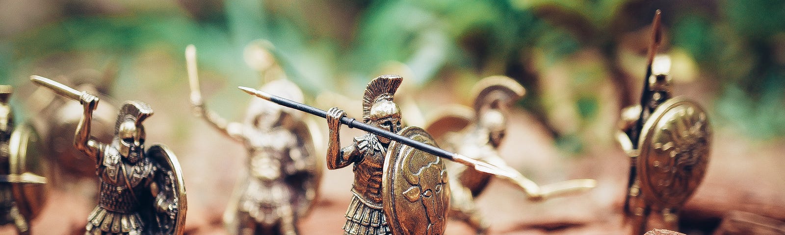 Roman-esque miniature warriors in battle metaphorically displaying the battle for the soul of America.