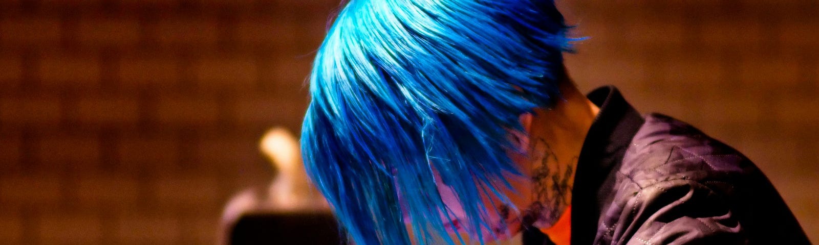 A punk rock fan with blue hair