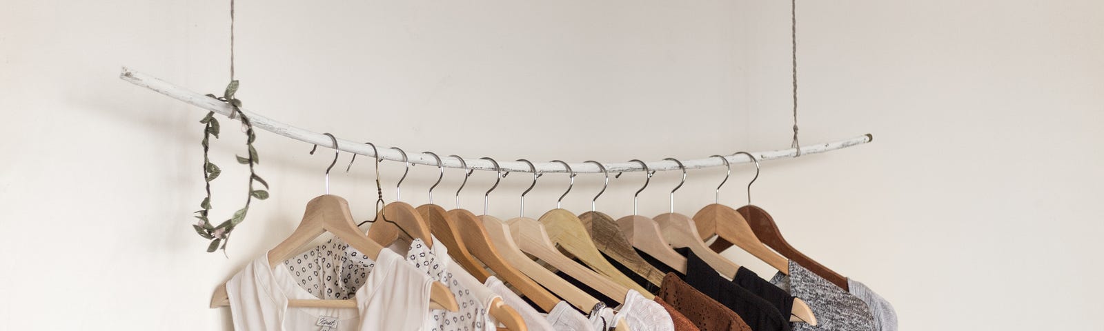 Minimalist clothing rack organized by color