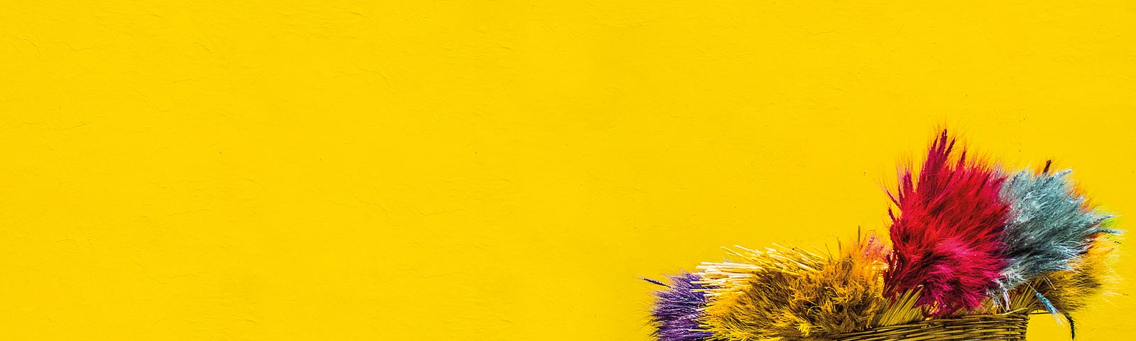 man carrying basket against a yellow wall https://www.newsbreak.com/publishers/@561573