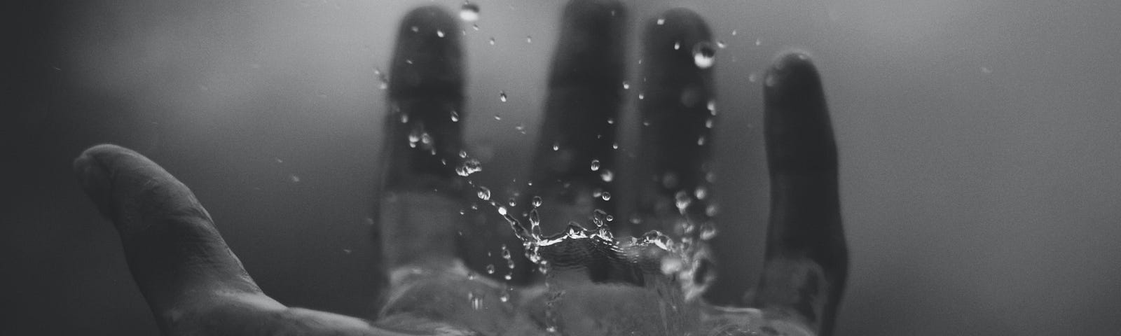 Hand Catching Rain — Photo by Geetanjal Khanna on Unsplash