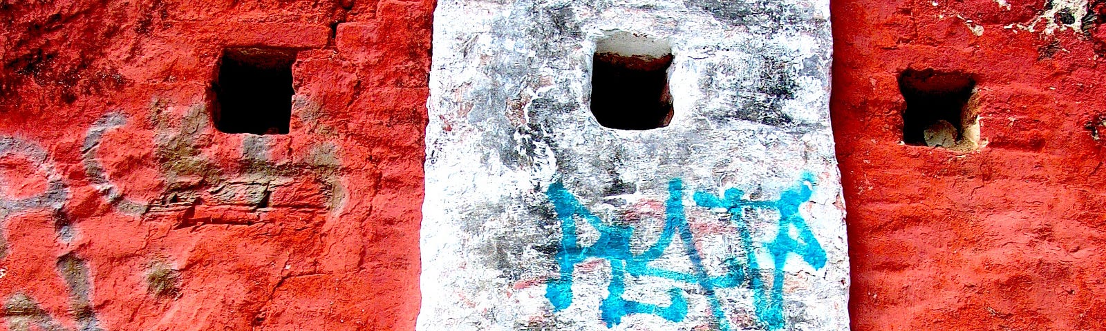 Graffiti on historic walls on Church Street in Christiansted, St. Croix. By Stephanie Hanlon