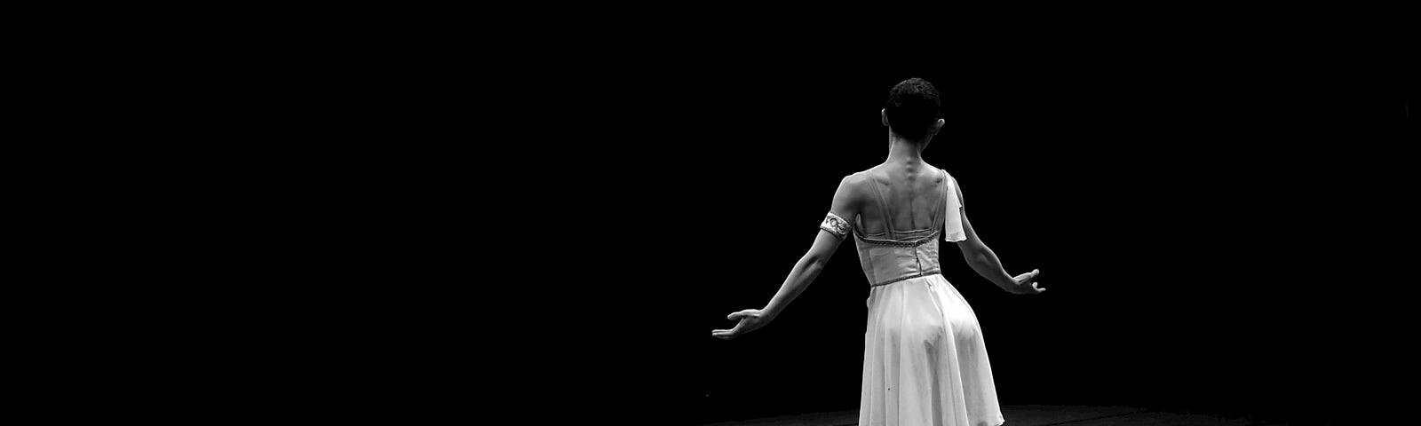 Ballet dancer dancing in black and white photo