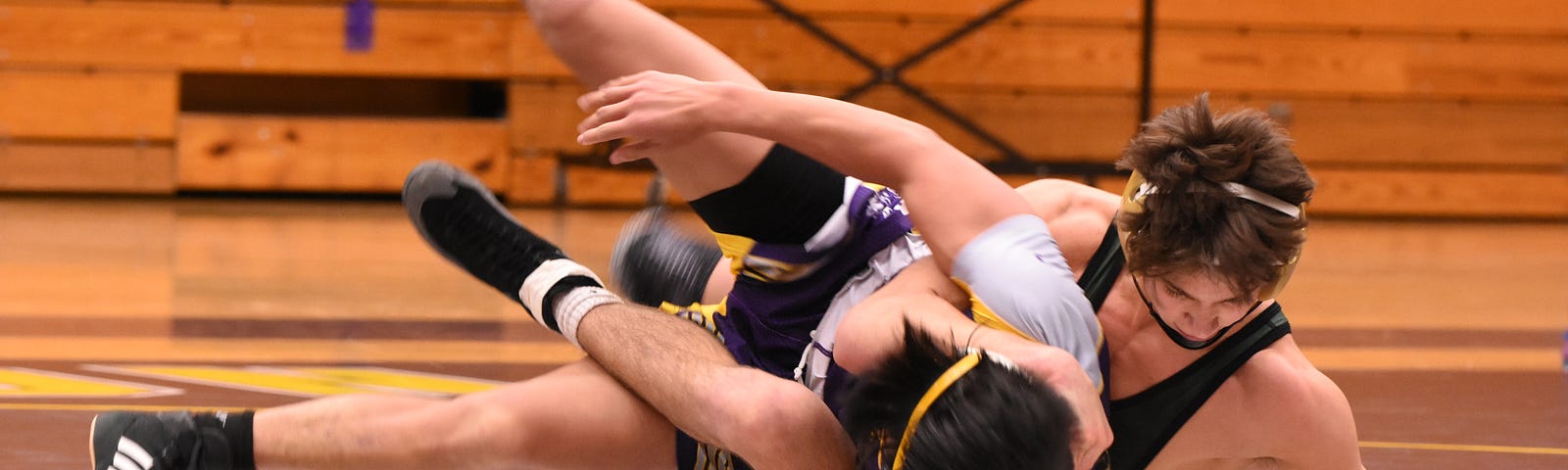 Two wrestlers wrestling