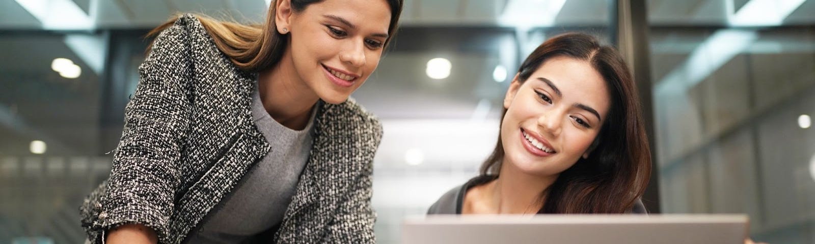 women discussing UX trends