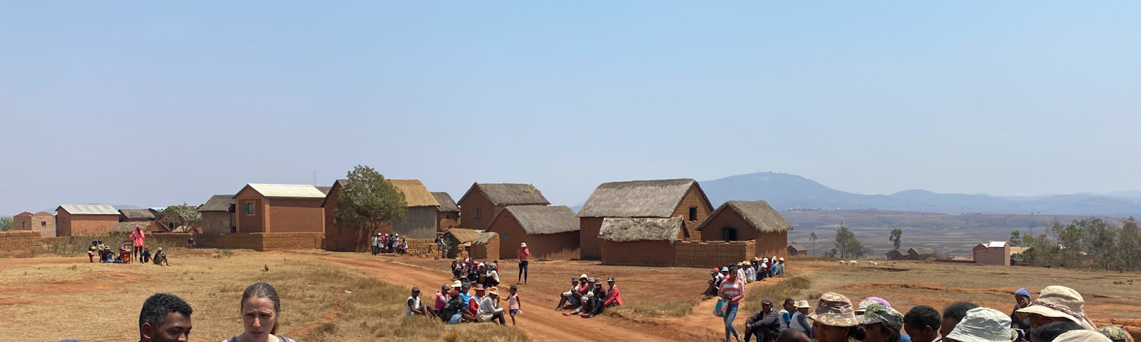 Julio, an anthropology graduate student from the University of Antananarivo, and Sarah, a cultural anthropologist representing Variant Bio, sharing research results with a participating community in the central highlands of Madagascar.