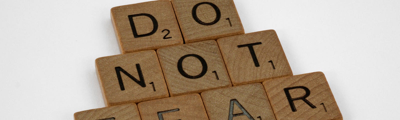 Scrabble tiles spelling out DO NOT FEAR