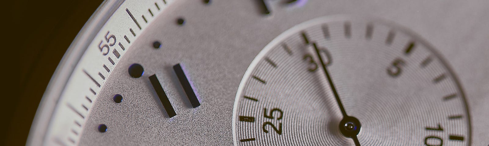 A stopwatch in close-up, showing the 10:00 to 1:00 portion of the face. I want to explore how you can focus on your pulse, physical ability, and exercise tests to assess your health. All of these can be excellent ways to measure your fitness.