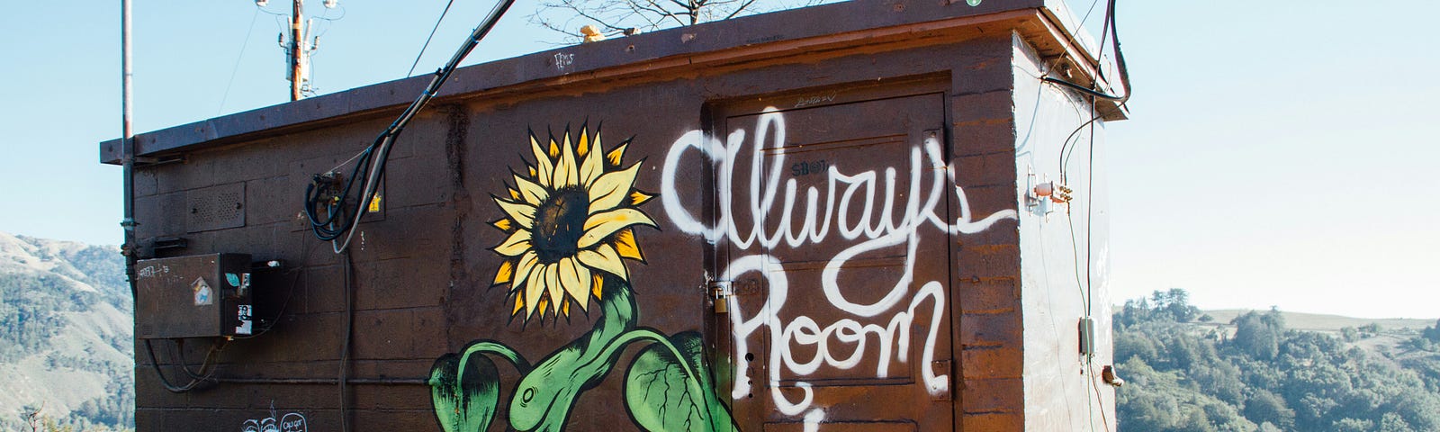 tiny house with sunflower and “always room to grow” written on it to represent things from other writers that make me think