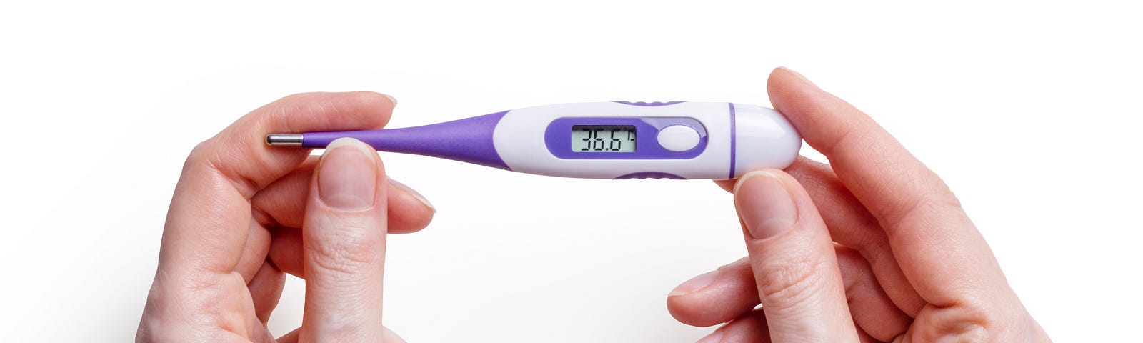 A digital thermometer displays temperature of 36.6 degrees.