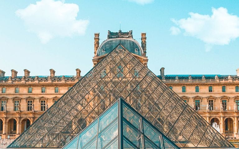 The Louvre. A container and a construct that provides a CONTEXT that drastically raises the value of its artistic content.