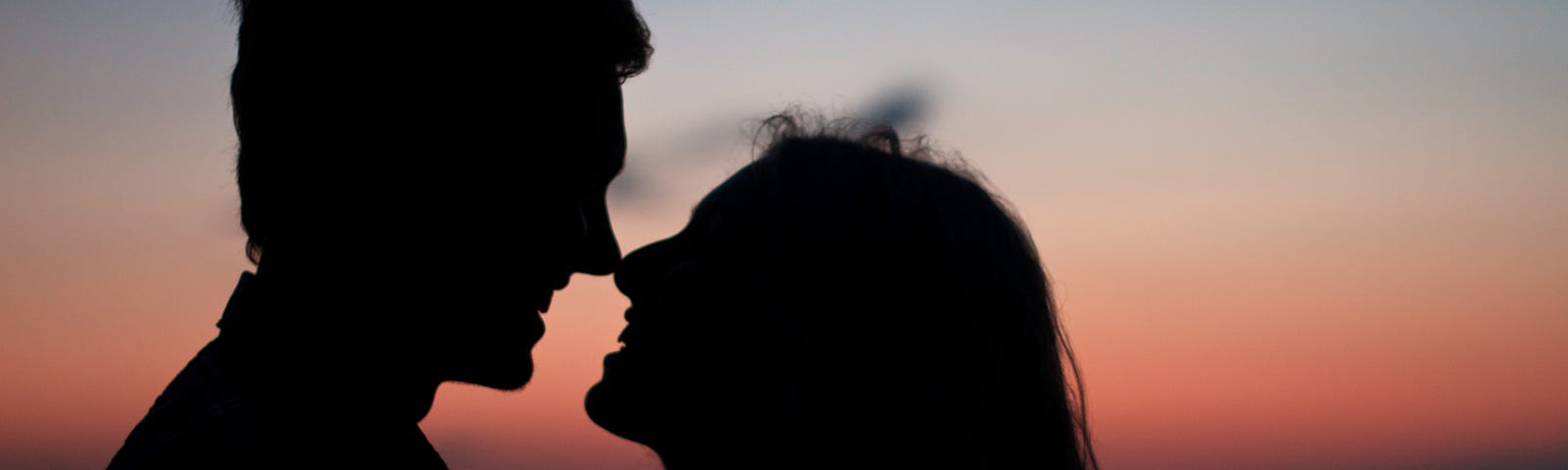 Image of a couple about to kiss.