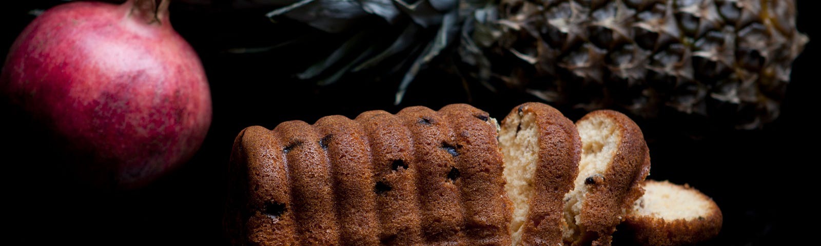 a festive loaf of holiday bread, with apple and pineapple