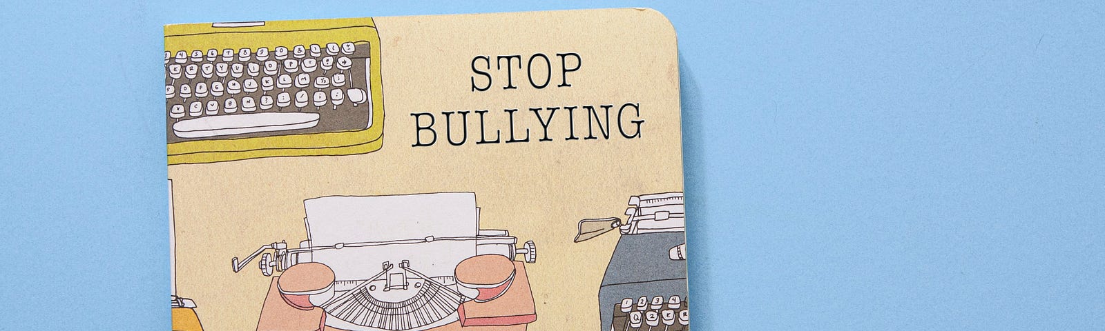 Photo that States “Stop Bullying” by Dee @ Copper and Wild on Unsplash